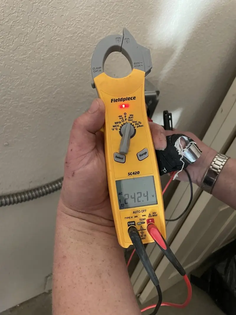 Voltage testing with clamp meter during Aluminum Wiring Replacement in Portage